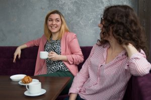 Girls discussing options on home for sale 