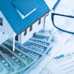 tax consequences when selling a house I inherited | house on cash glasses