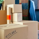 Selling Your House When You Need to Relocate | moving boxes