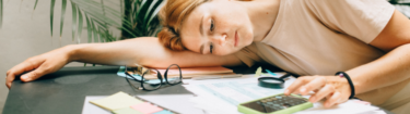 4-Hidden-Costs-You-Can-Face-When-Inheriting-a-Property-in-louisiana woman with calculator