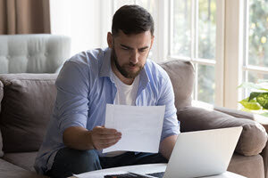 landlord checking paperwork on tenants