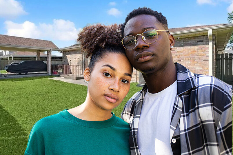 smiling young couple in back yard