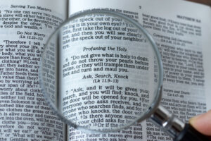 Open Bible with highlighted verses related to home selling