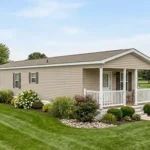 Comparison of a manufactured mobile home and a traditional single-family house in New Jersey.