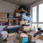 Packed moving boxes in a hoarder house being sold in Ewing NJ