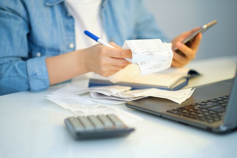 A homeowner calculates how much it cost her to fix up her house.