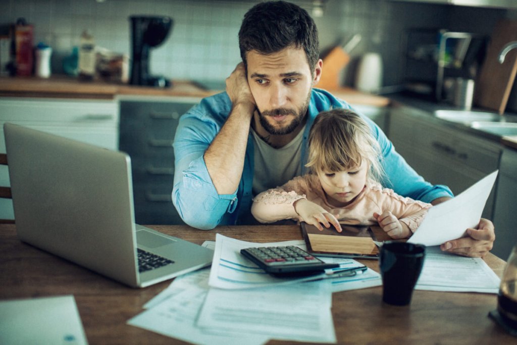Close up of a father who is worried about paying his mortgage.