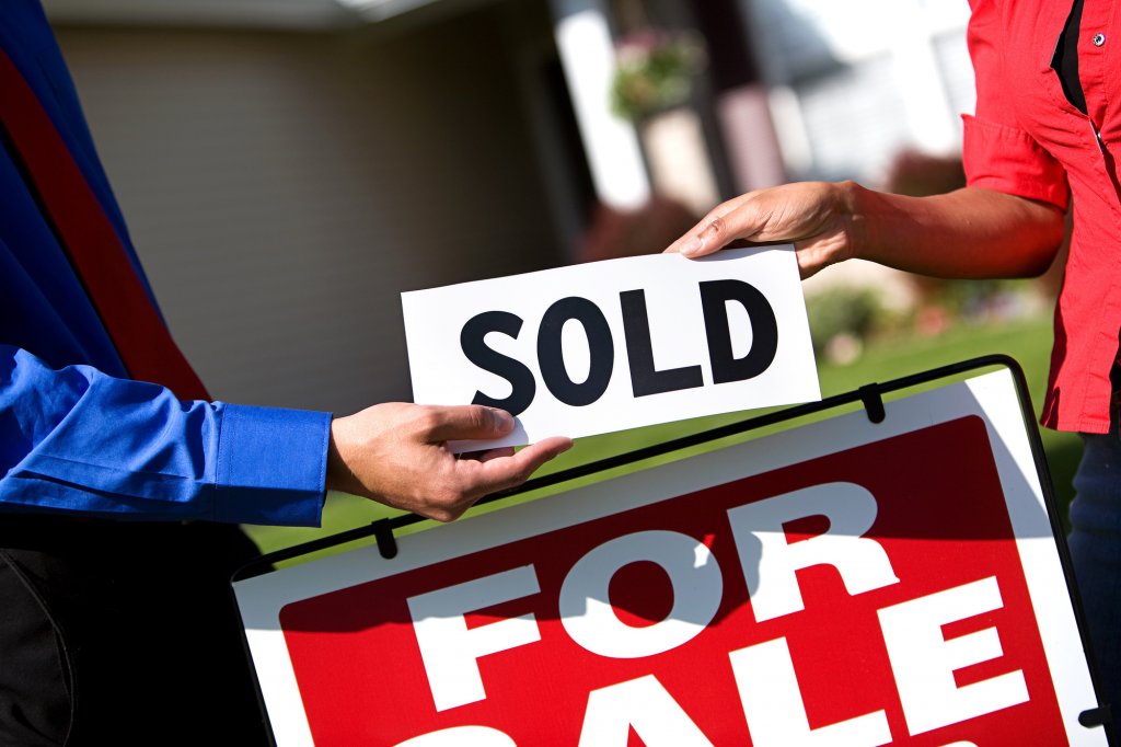 Extensive series of a Caucasian Real Estate Agent and African-American Couple in front of a home.