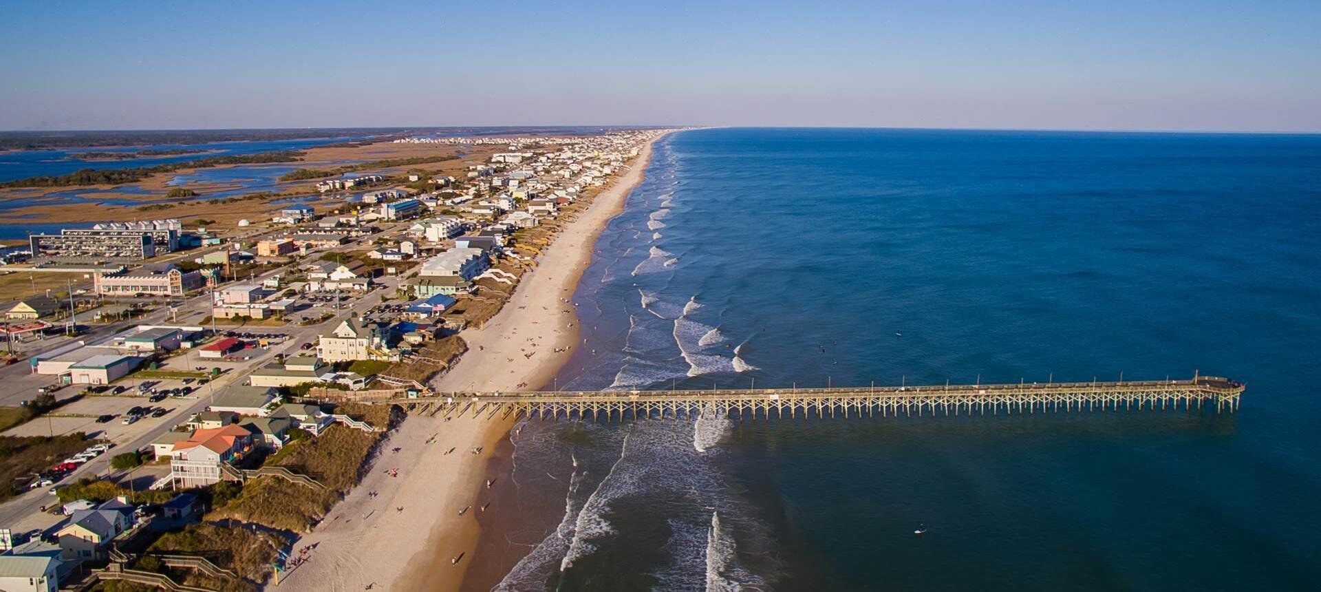 Jolly Roger Pier and Atlantic coastline in Topsail Beach, Pender County, North Carolina