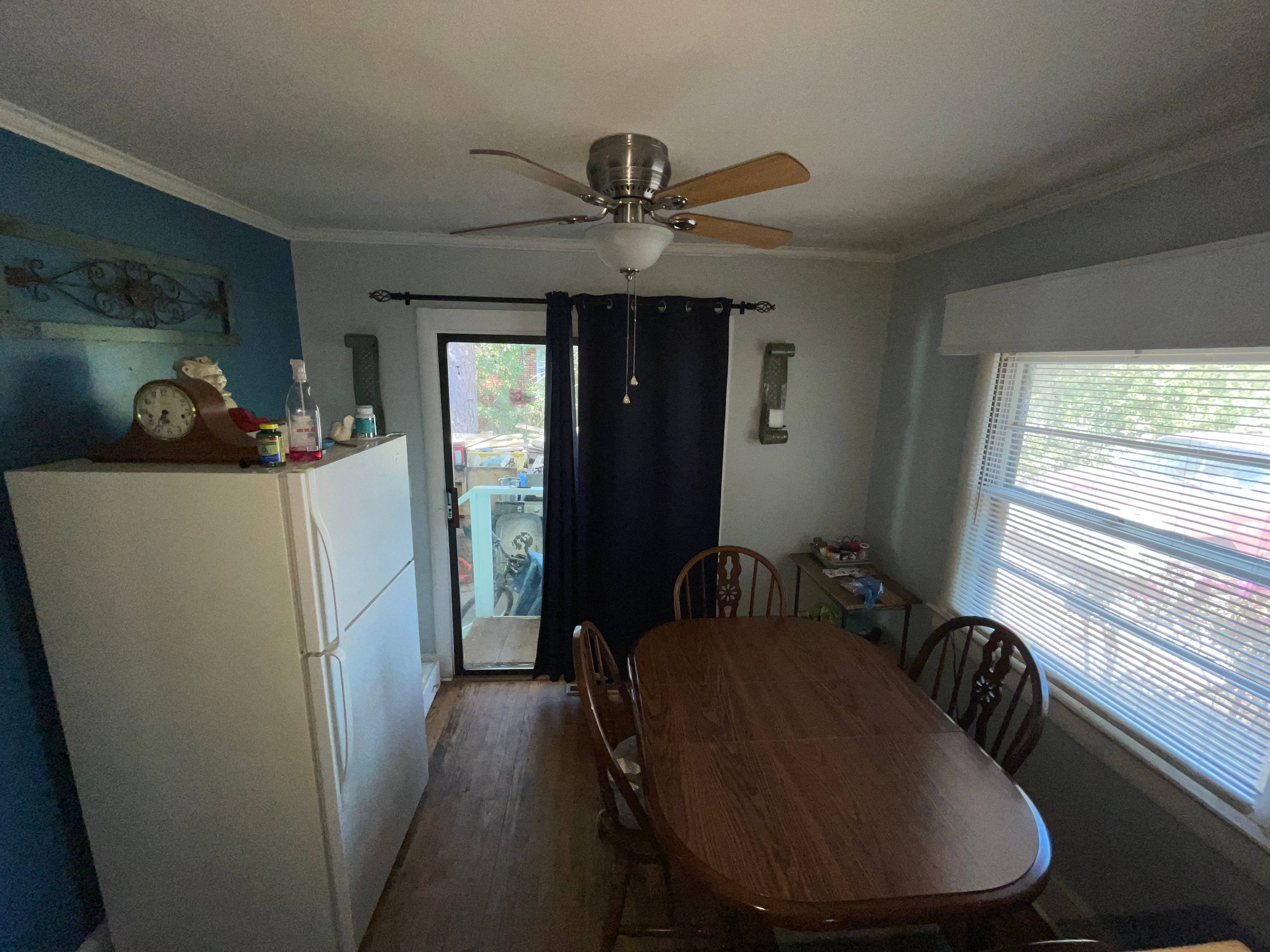 Closed-in dining area before renovation at a Devon Park Wilmington house