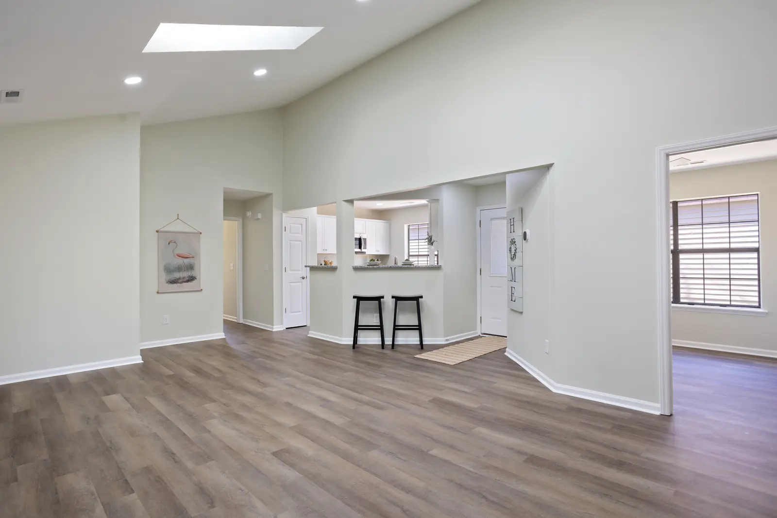 Bright renovated living area with new flooring in Wilmington