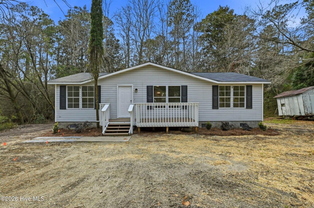 Renovated ranch house on Wildwood Circle in Hampstead, NC with a new front porch