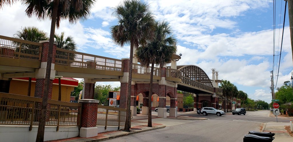 Downtown Apopka street view with palm trees and local architecture