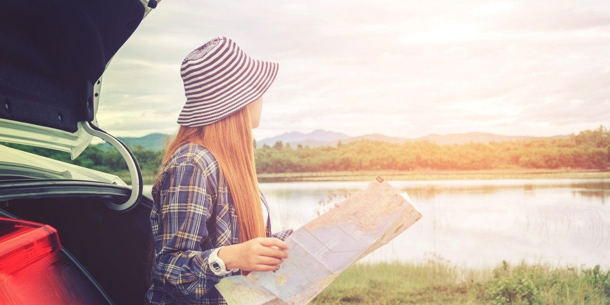 Why Selling Land Is Different Than Selling Your House | woman on lake