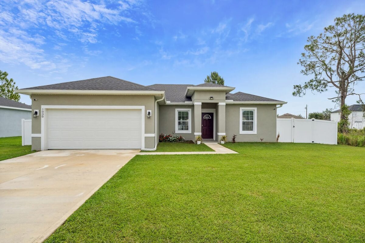 Front exterior of 1030 James Dr in Poinciana, Florida