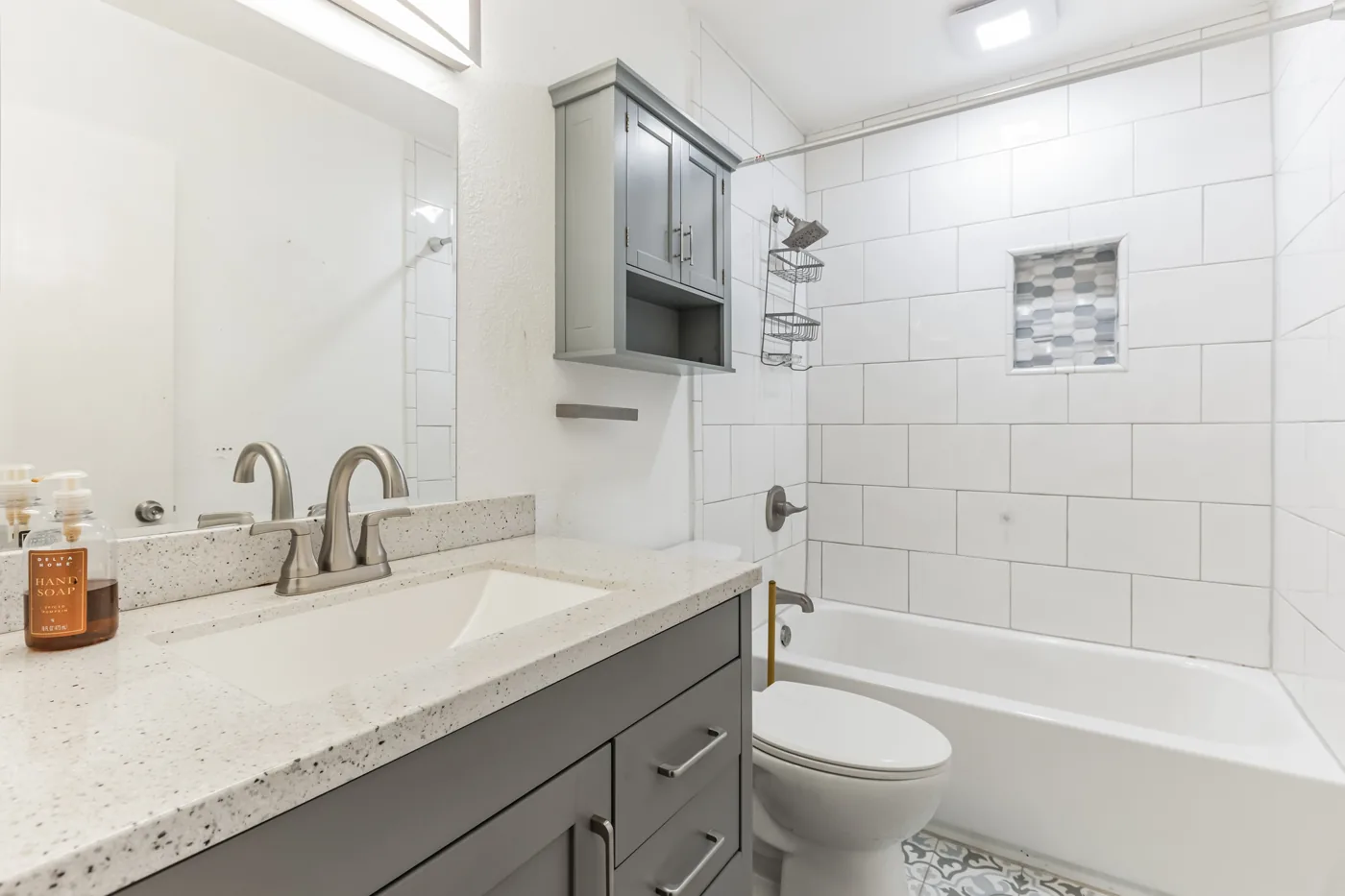 Bathroom at 136 115th Ave NE in St. Petersburg after cosmetic work