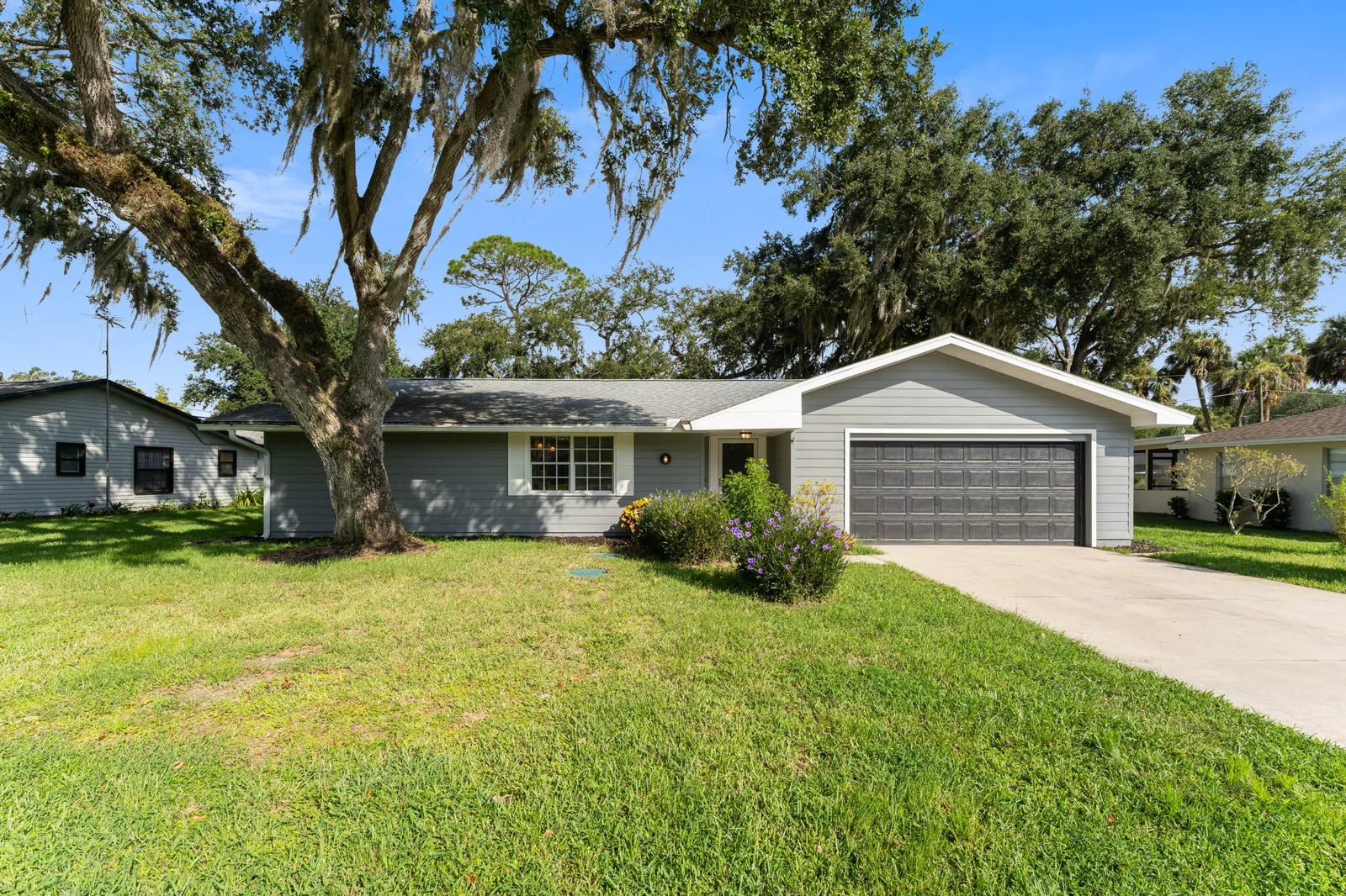 Later professional exterior photo of 1499 Van Eck Rd NE in Palm Bay, Florida