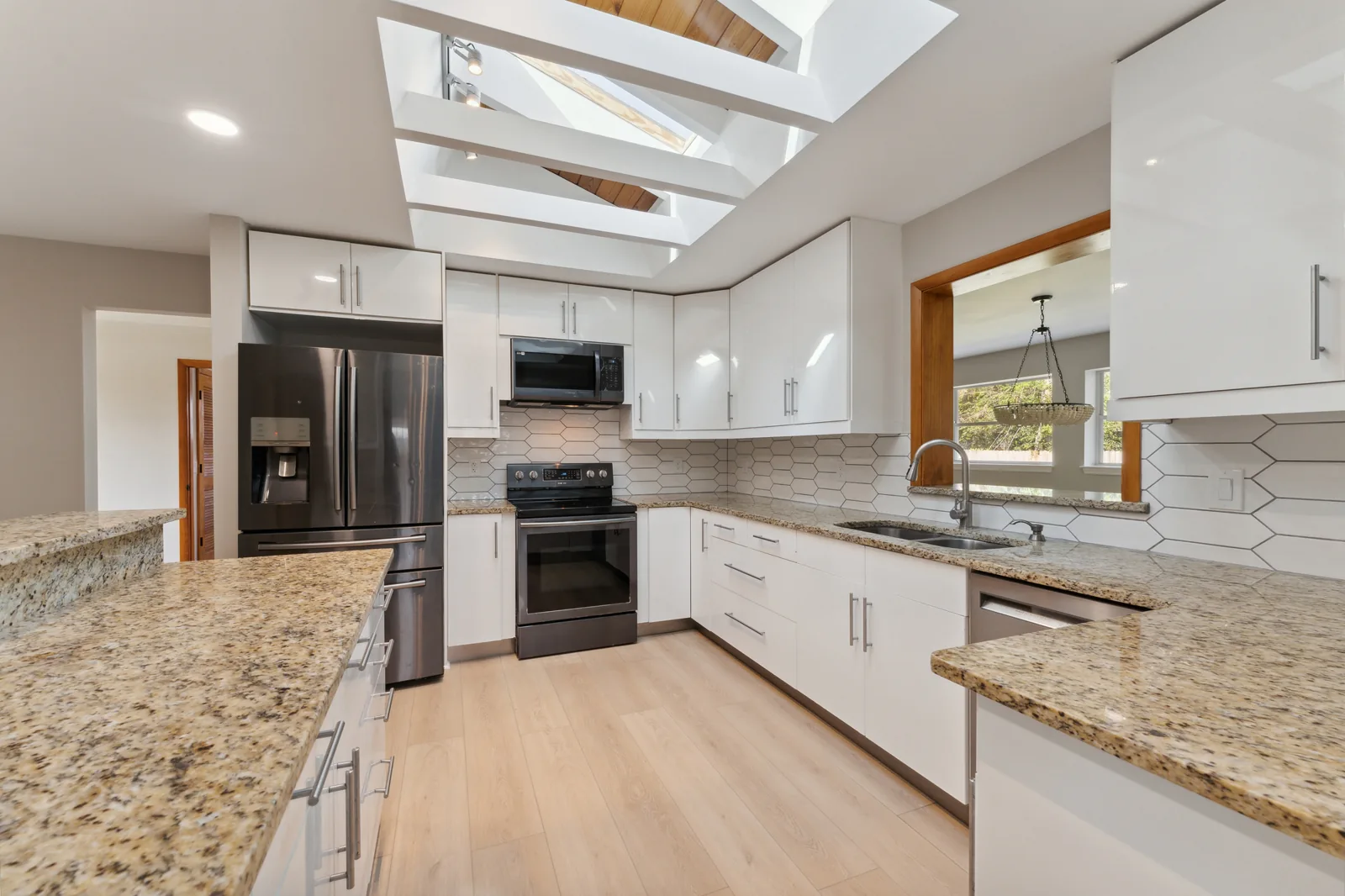 Later professional kitchen photo at 1499 Van Eck Rd NE in Palm Bay, Florida