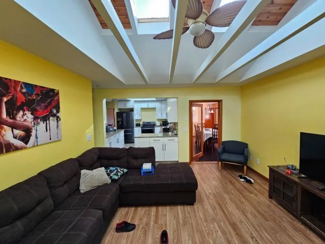 Living room at 1499 Van Eck Rd NE in Palm Bay, Florida, in original condition