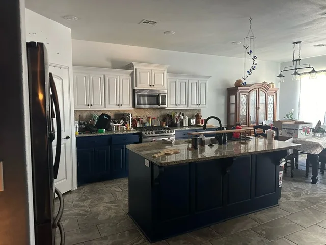 Kitchen and island at 20507 East 31st Place South