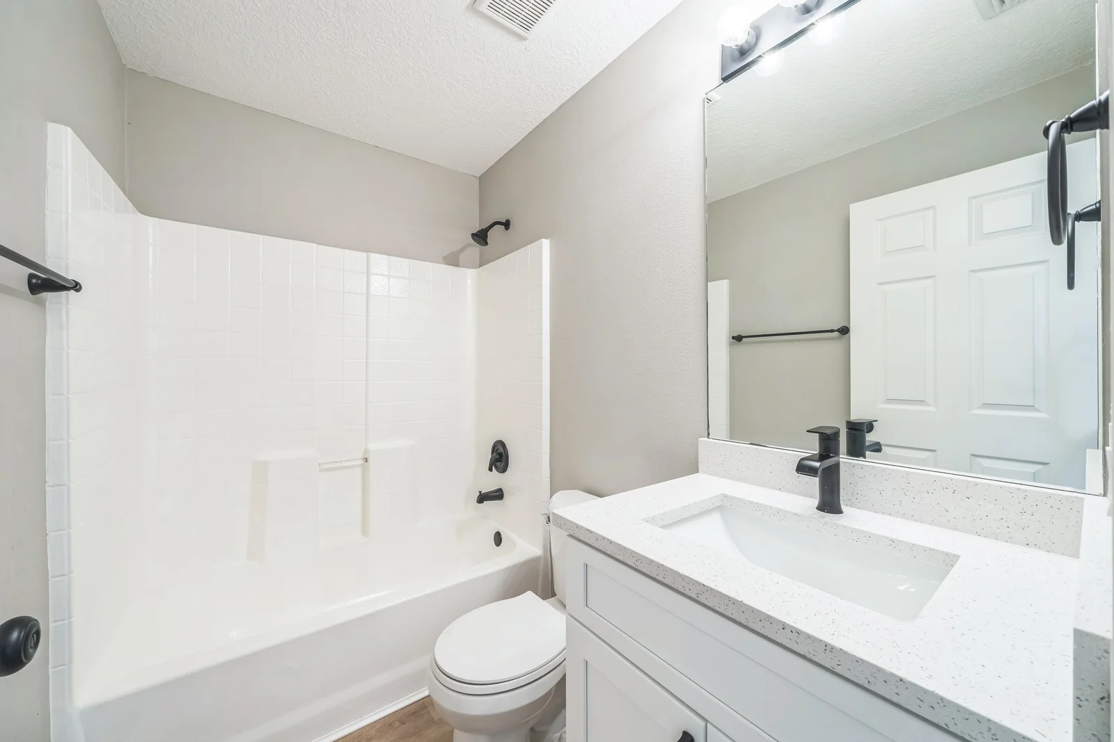 Bathroom at 2077 Dogwood St in Palm Bay, Florida, after renovation