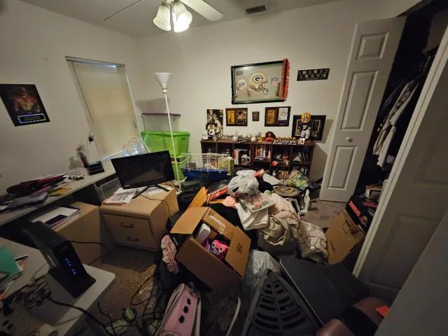Interior room at 2077 Dogwood St in Palm Bay, Florida, before renovation