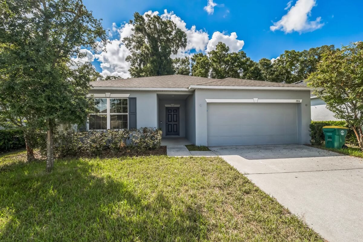 Front exterior of 286 E Fiesta Key Loop in DeLand, Florida, after renovation