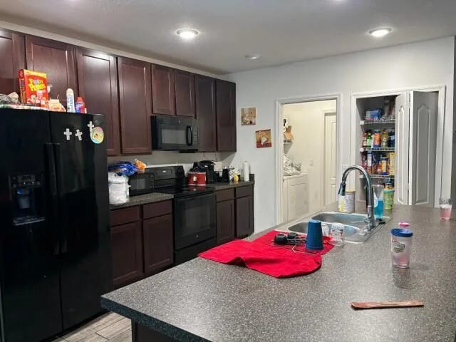 Kitchen at 286 E Fiesta Key Loop in DeLand, Florida, before renovation