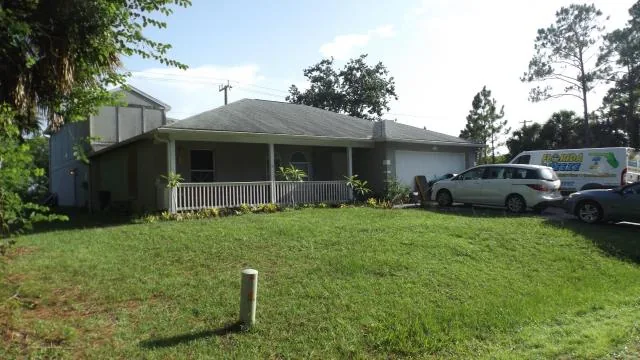 Seller-provided exterior photo of 434 Lambert St SW in Palm Bay, Florida