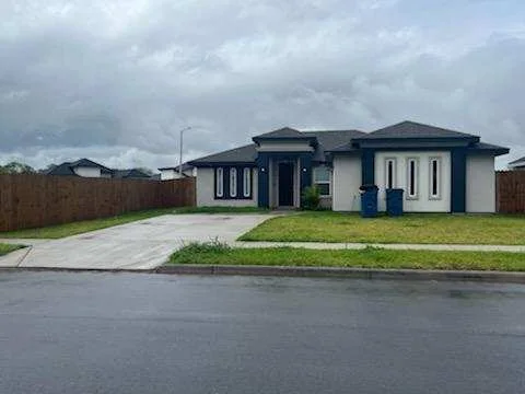 Front of 623 Marrs Avenue with a driveway and lawn