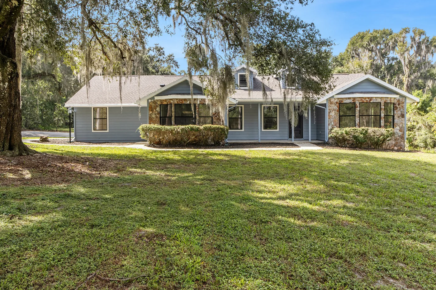 House exterior and lawn after renovation