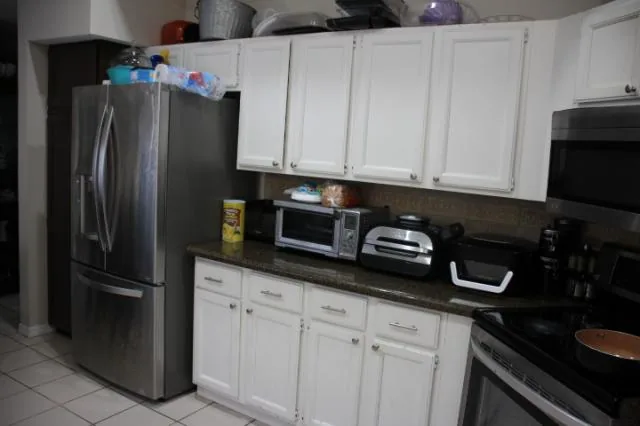 Kitchen before renovation at 7403 Ashley Shores Circle in Lake Worth, Florida