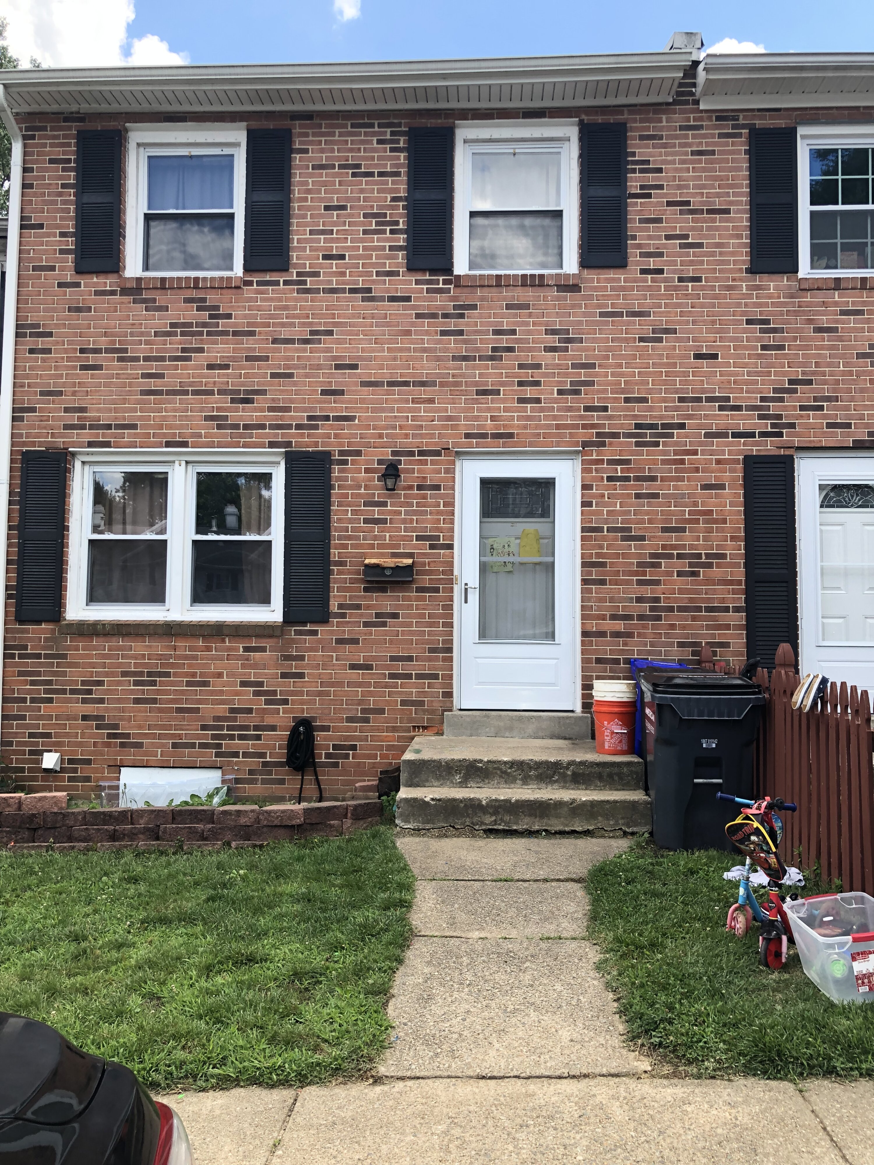 Brick-front exterior of 14648 Bakersfield St in Woodbridge