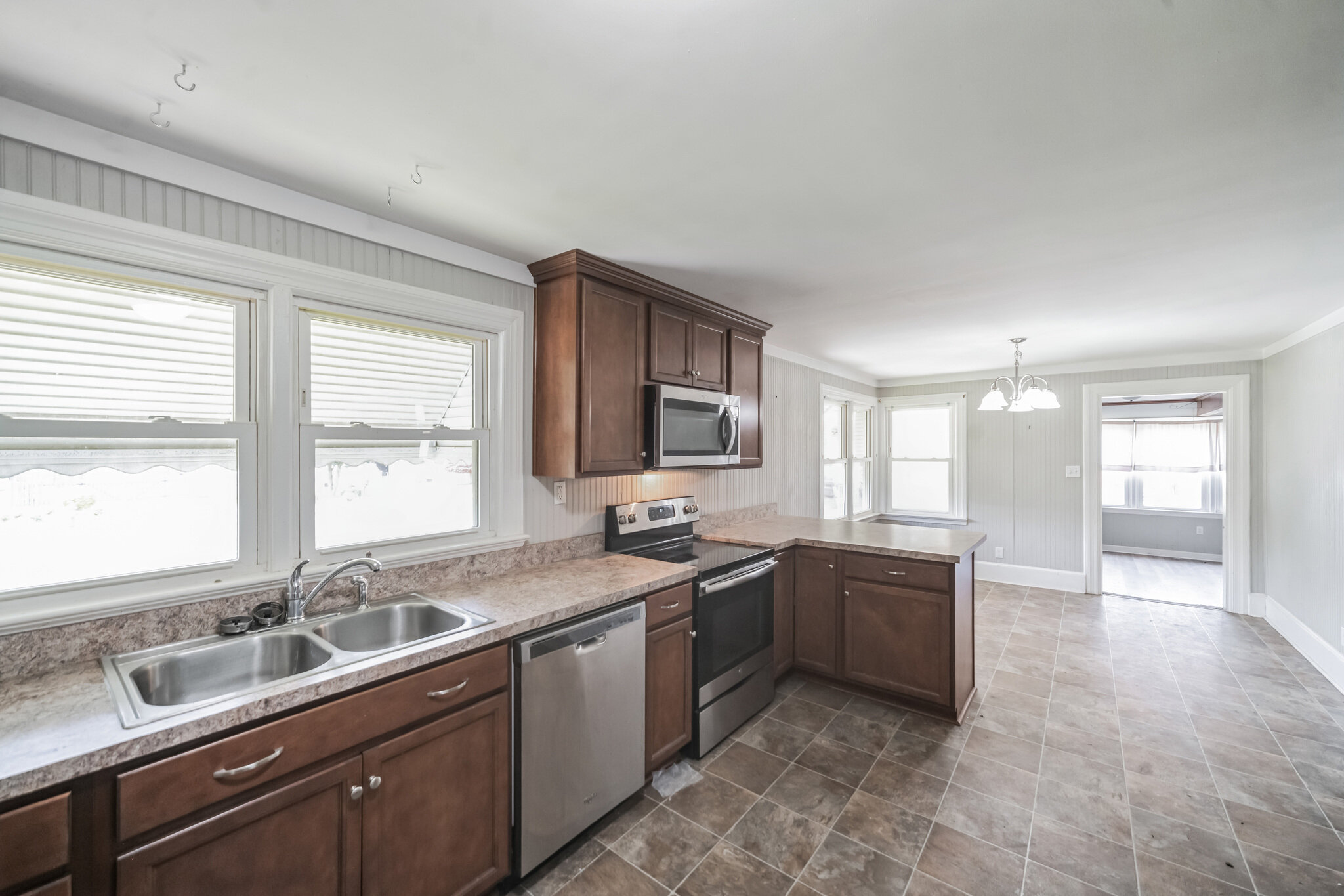Kitchen and adjoining dining area at 107 Cedar St