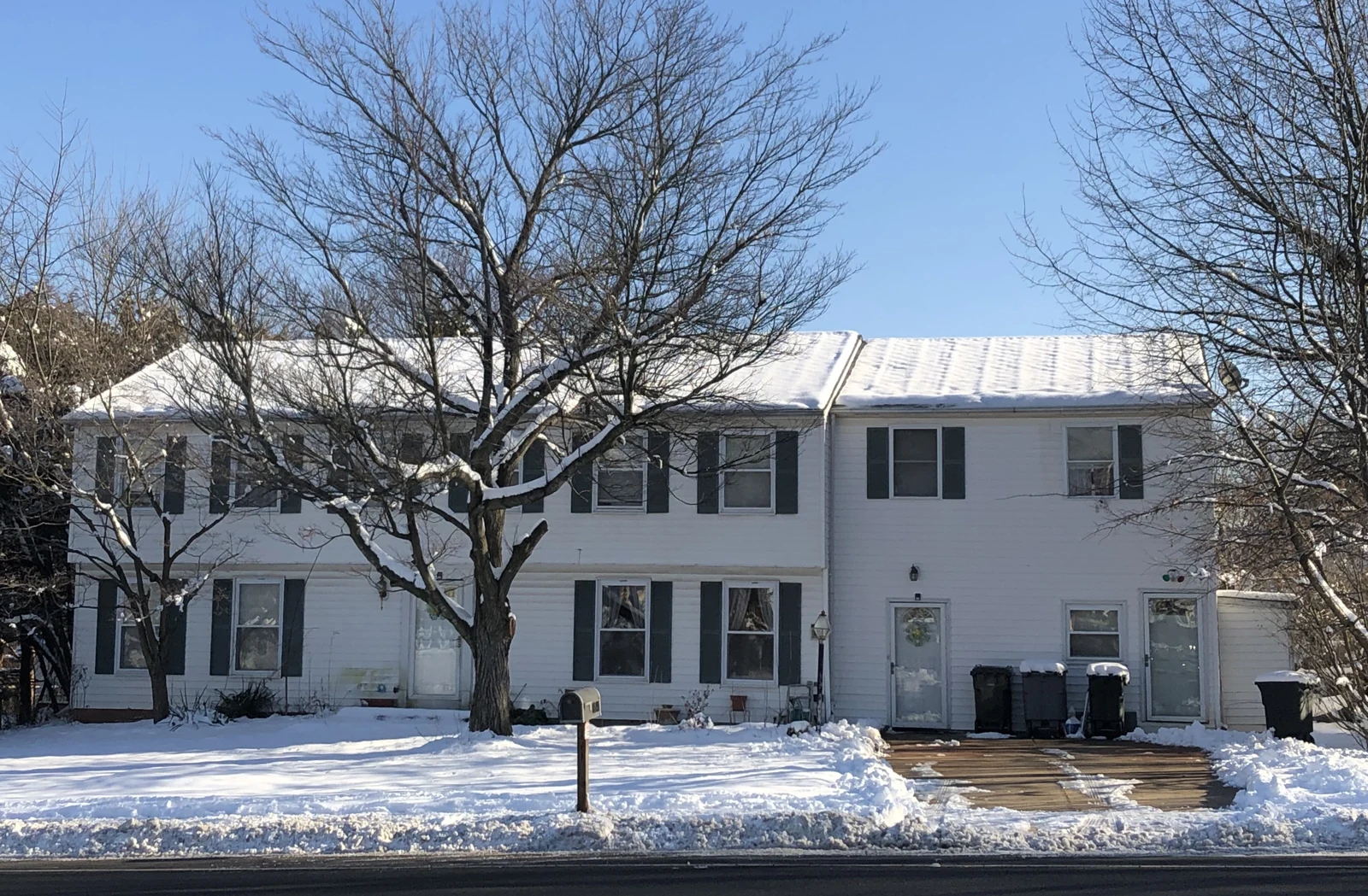 Exterior of 8641 Liberia Ave in Manassas with snow on the grounds