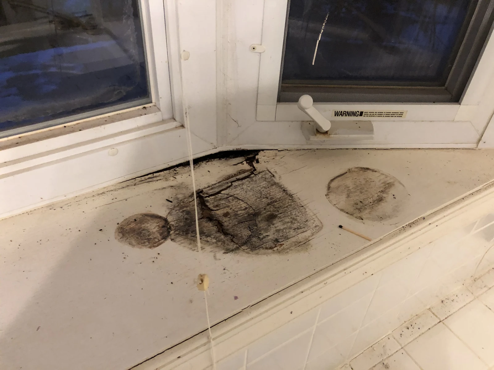 Discoloration near the windows at 8641 Liberia Ave