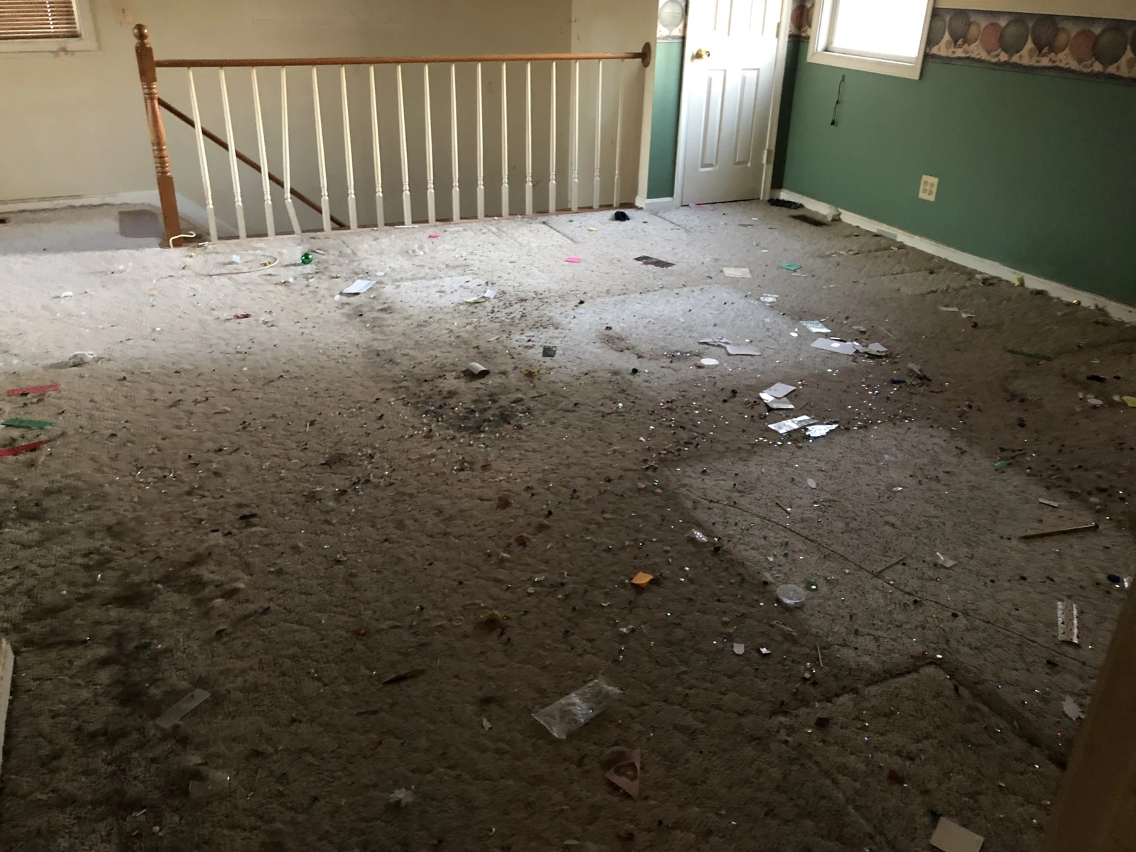 Carpeted room with debris at 8641 Liberia Ave