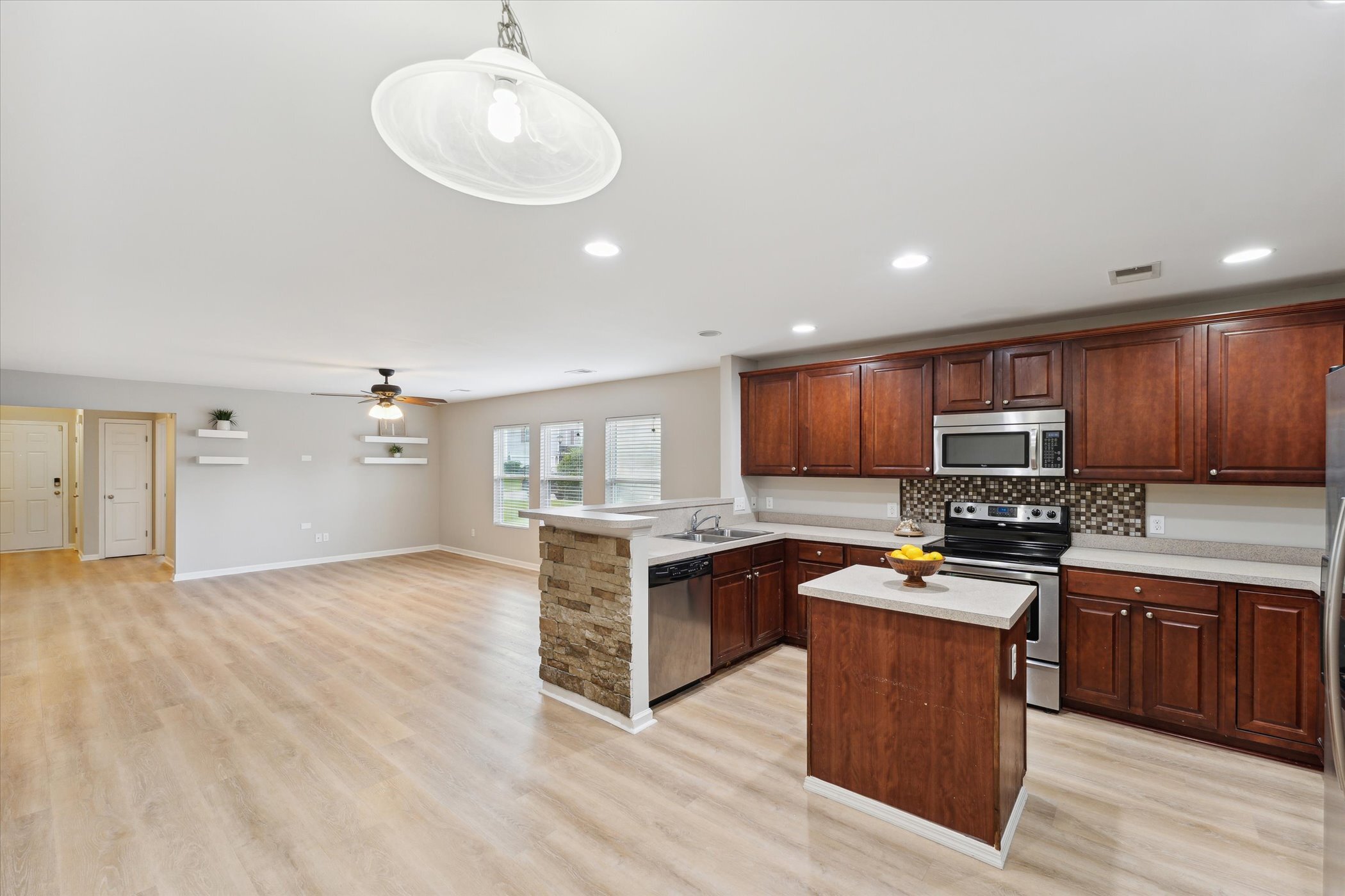 Kitchen and dining area at 445 Lions Den Dr after updates and removal of belongings