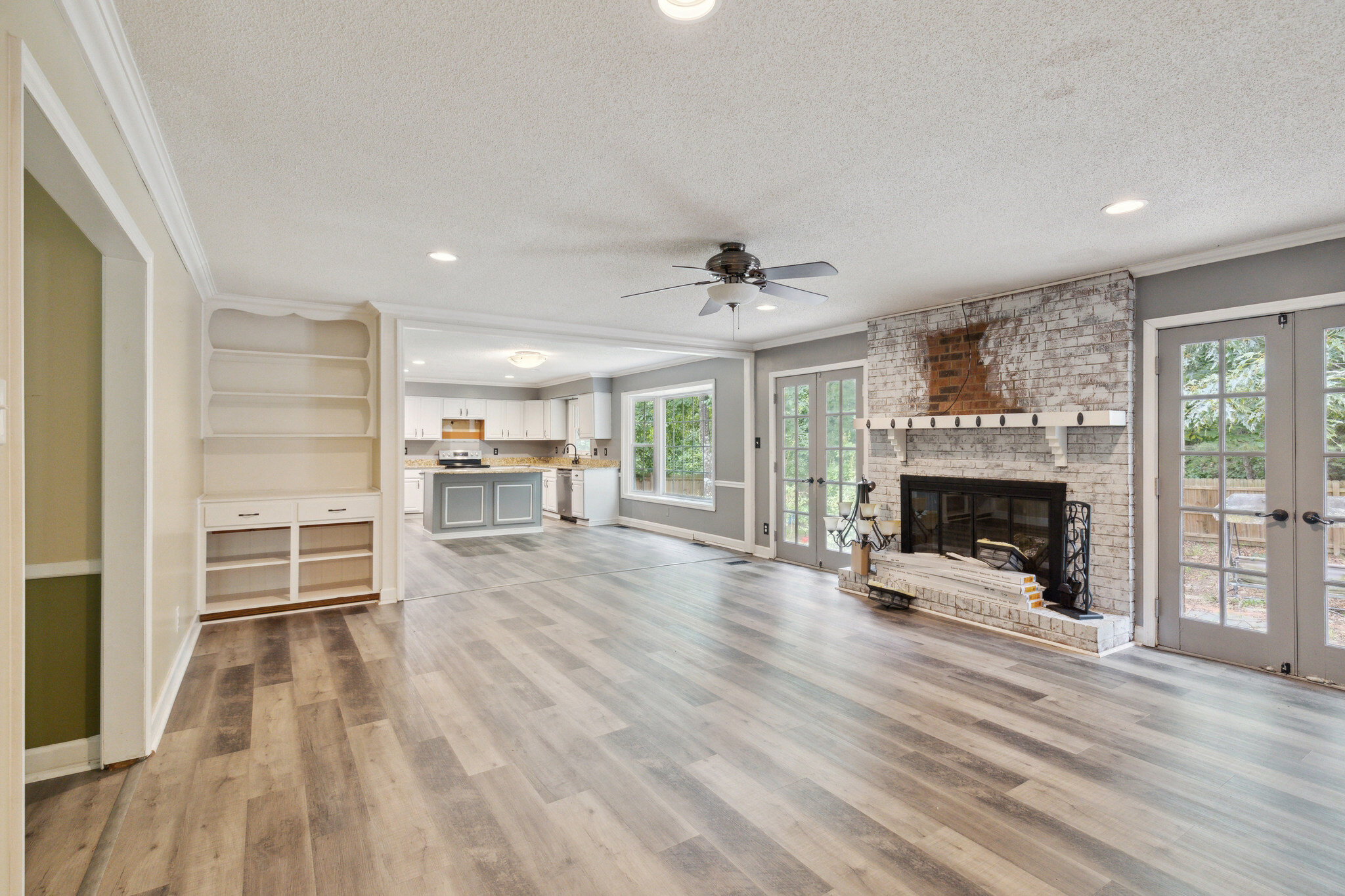 Open living and kitchen area at 2002 Pinewood Terrace in later property photos