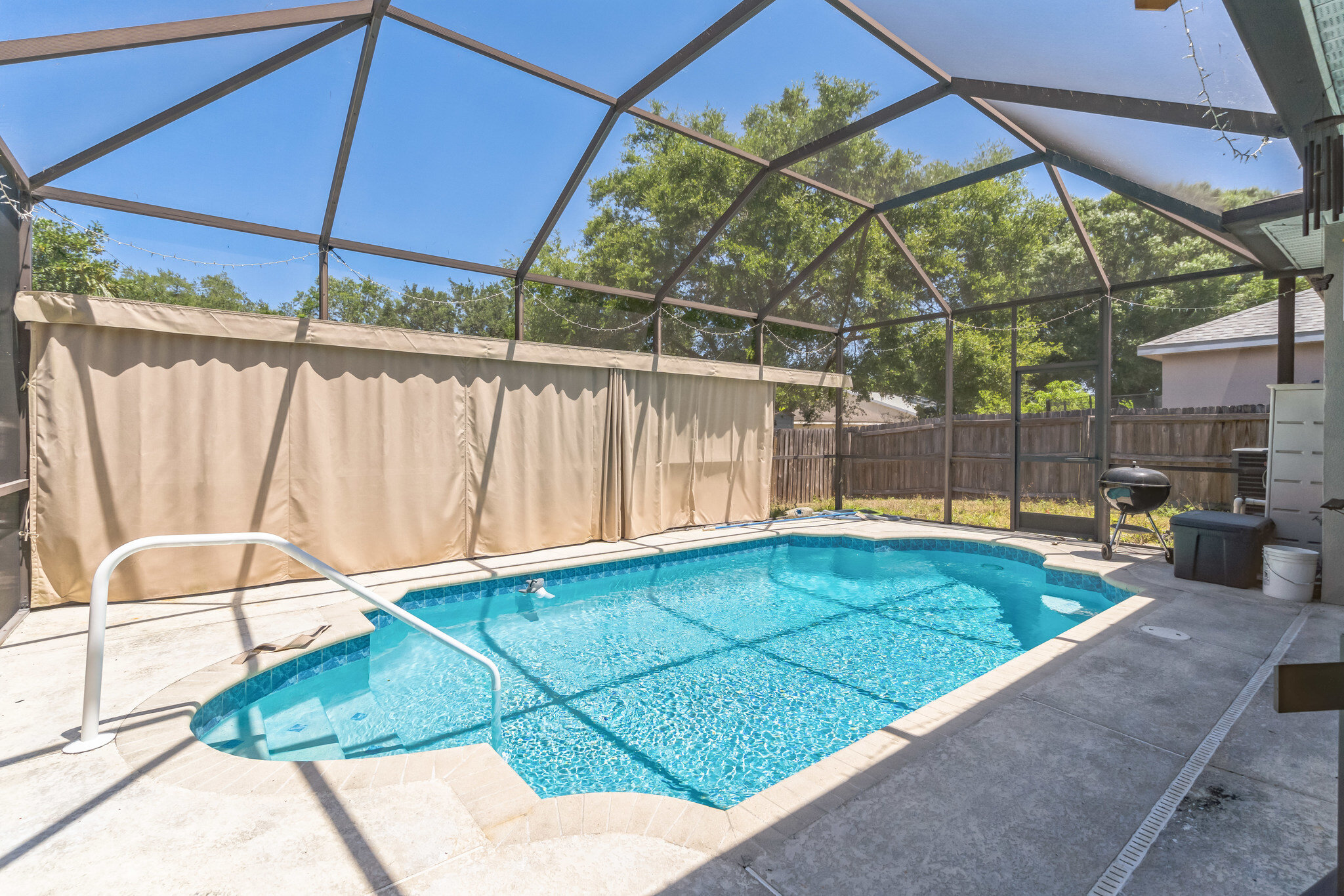Screened swimming pool at 11028 Silver Dancer Dr in Riverview