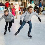 kids ice skating at an ice rink