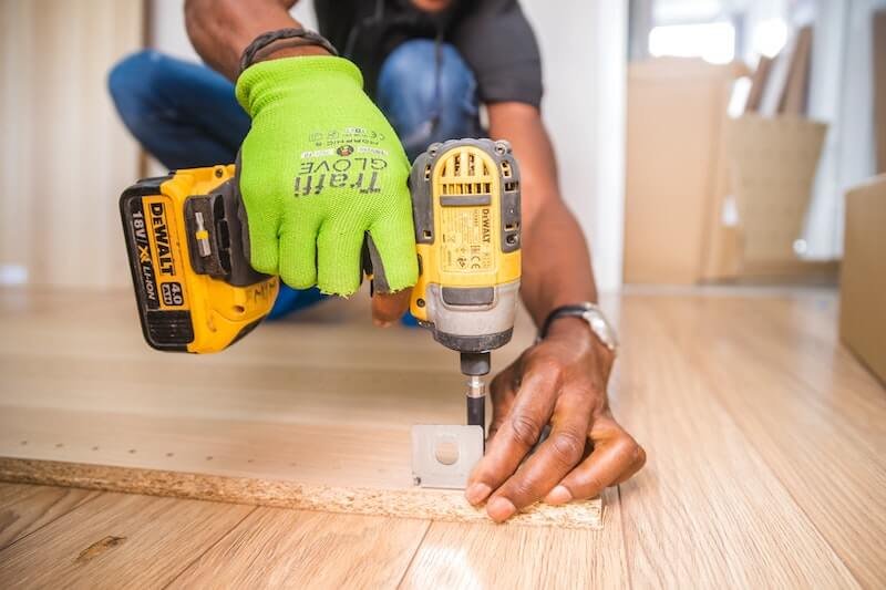 Handyman doing home repairs in rental property