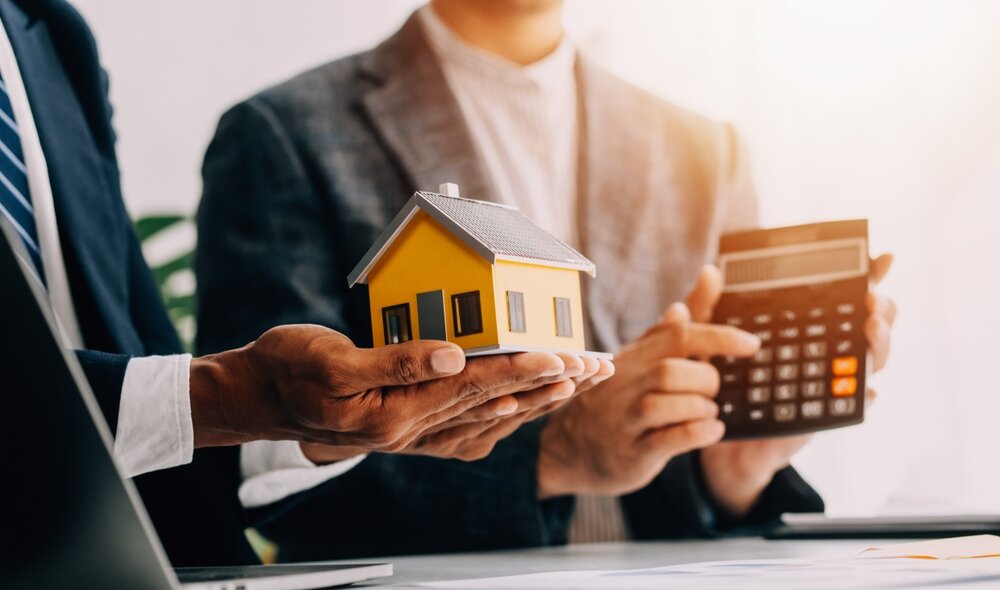 Real estate agent and customer signing contract to buy house, insurance or loan real estate.