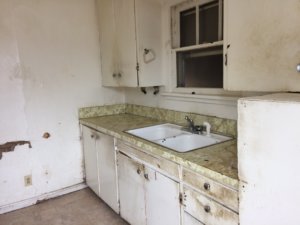 Kitchen looks 68 years old, or worse.