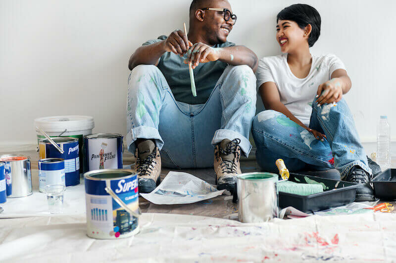 couple repainting smoke smelling rooms