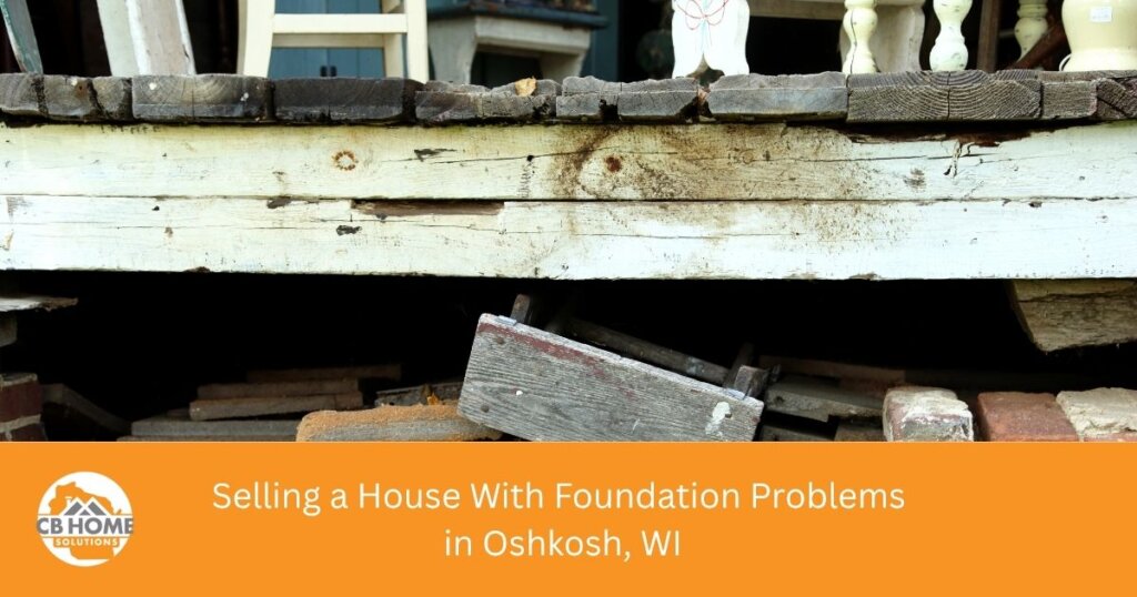Cracked stone basement wall in an older Oshkosh home with foundation problems