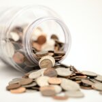 The Pre-Approval Process - coins saving up money for a house