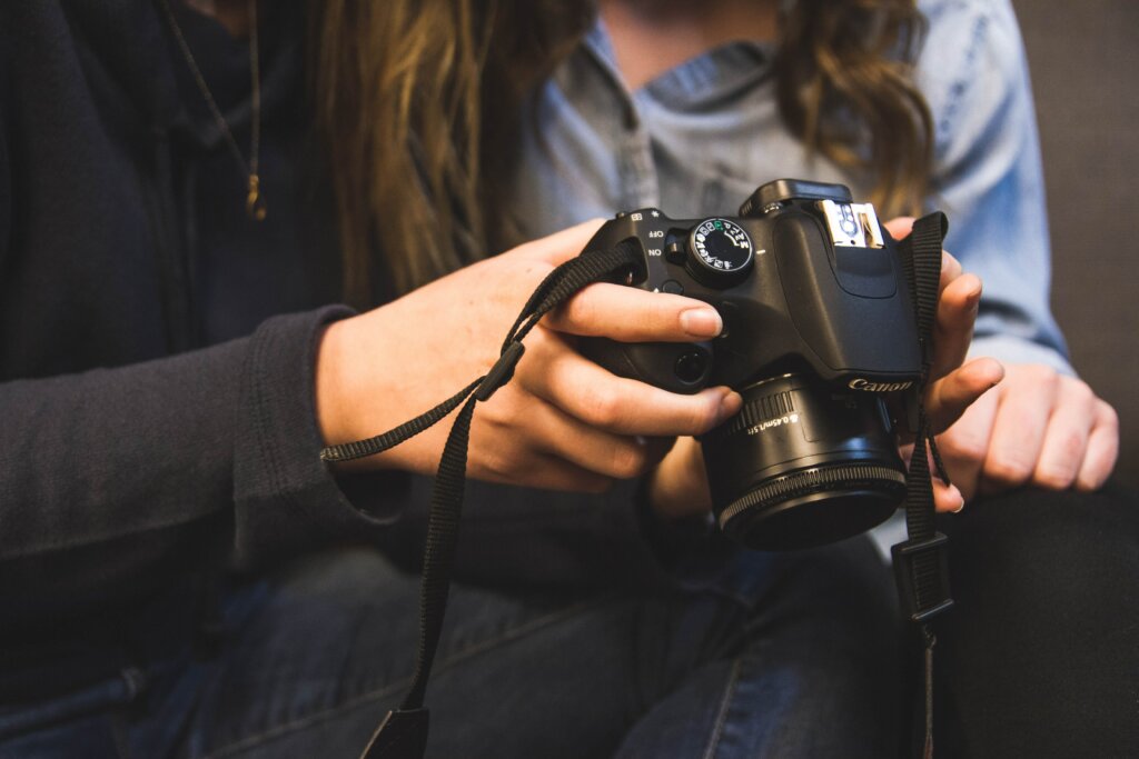 5 Ways To Get Great Listing Photos of Your Greater Cincinnati Area or Northern Kentucky House - person holding camera