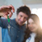 Selling vs. Renting Out a Home- Handing over keys