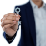 Benefits of Hiring An Agent Over An FSBO- Agent holding key